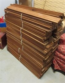 stack of wood, wall board?