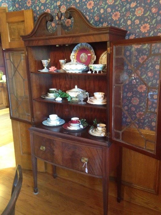 Large antique china cabinet with double doors