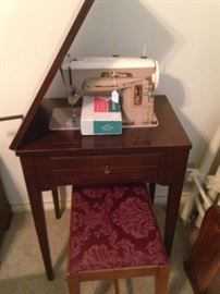 Sewing machine and bench