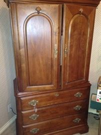 Entertainment armoire with extra drawer storage