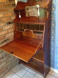 Antique secretary with mirror