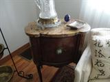 another view of the cabinet, beautiful wood, gorgeous marble and a great looking cameo on the door