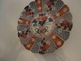 imari charger on the dining room wall