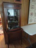 the curio/vitrine in the living room- european and so well made