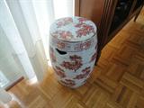 a garden stool in rust and white