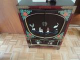 vintage oriental cabinet in the foyer