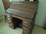 old roll top desk in the office-the top rolls very nicely by the way