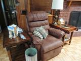 old leather chair in the den side tables