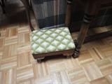 needlepoint footstool in the den area- wonderful work