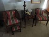pair of chairs with cane backs in the master bedroom