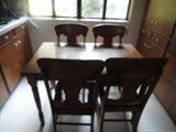wonderful kitchen table withfour nice chairs, beautifully refinished