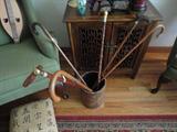 a great collection of vintage canes- some with inscriptions