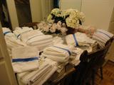 there are lots of set of good looking bed linens and towels, many with embroidery and great needlework