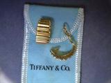 18kt gold tiffany clips Omega style