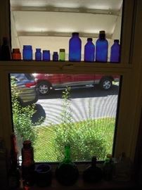 collection colored bottles