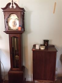 Howard Miller tall case clock, music sheet cabinet (one of two)