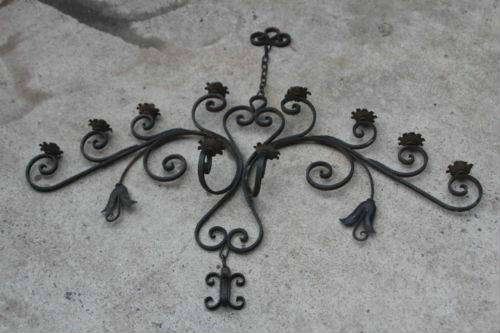 Antique wrought iron candle light fixture