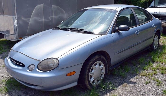 At 8PM: 1998 Ford Taurus SE Estate Auto with Blue Exterior, Gray Cloth Interior; 48,674 Miles; Power Windows, Mirrors, Locks; Remote Keyless Entry Fob; Air Conditioning; Cruise Control; AM/FM Stereo with Cassette and CD, and more. VIN:  1FAFP52U8WA151454