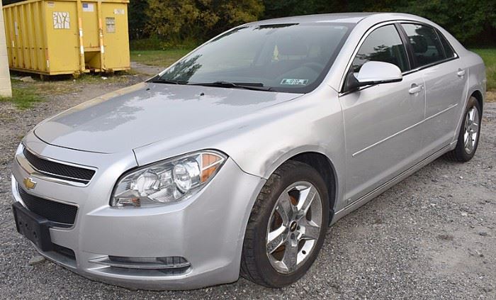 At 8PM: 2009 Chevy Malibu LT Sedan Estate Auto with 83,419 Miles; Silver Exterior, Black Sport Cloth Interior; Power Windows, Mirrors, Locks; Remote Keyless Entry Fob; Power Driver's Seat; AM/FM Stereo with CD, and more. VIN: 1G1ZH57B39F247908