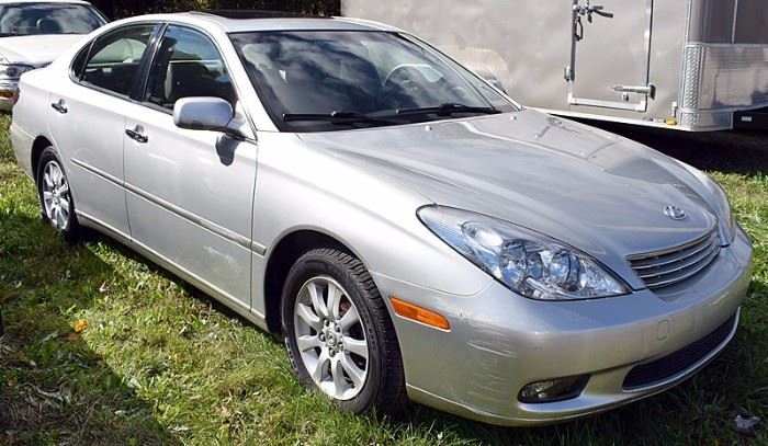 At 8PM: 2002 Lexus ES300 Estate Auto with 28,141 Miles; Silver Exterior, Light-Gray Leather Interior; Automatic Transmission; Power Windows, Locks, Mirrors; Power Front Seats with 2-position Memory Settings; Remote Keyless Entry Fob; Heated Front Seats; Dual Climate Controls; Power Tilt/Slide Moonroof; AM/FM Stereo with CD and Cassette, with RDS and Lexus Premium Sound System; Cruise Control, and much more. VIN: JTHBF30GX20074968
