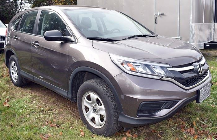 At 8PM: 2015 Honda CRV Estate Auto with only 13,570 Miles; AWD; Copper-Gray Metallic Exterior, Black Sport Cloth Interior; Power Windows, Locks, Mirrors; Remote Keyless Entry Fob; ABS and Honda ECON Mode; AM/FM Stereo with CD & AUX; 12V Power Outlet in Center Console; Hands Free Phone Connectivity with Speech Recognition; Steering Wheel Controls for Radio, Cruise, Communications, and much more. VIN: 2HKRM4H31FH685025