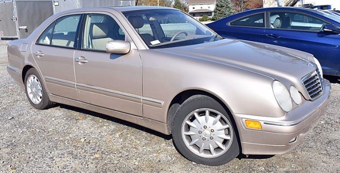 At 8PM: 2000 Mercedes-Benz E320 Sedan with 95,717 Miles; Beige Metallic Exterior, Tan Leather Interior; Power Windows, Locks, Mirrors; Power Seats with 3-pisition Memory; Power Moonroof; Power Telescoping Steering Wheel; Dual Climate Controls; Remote Keyless Entry; Hands-free Phone Connectivity; AM/FM Stereo; ABS; Electronic Stability Control, and more. VIN: WDBJF65J1YB015693