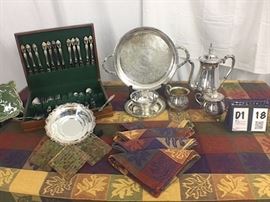 Oneida Silver: Onieda flatware (set for 12) in 15x12 chest, 8" bowl with attached underplate, 12" round platter with handles, 4" Creamer, 6" Sugar with lid (1 leg broke off), 8" bowl embossed, 11" teapot, 6' cloth with 4 linen napkins, California Pantry 6" trivet, and 3) Glass tile coasters 4x4