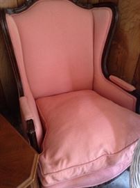 Peach colored wingback chair