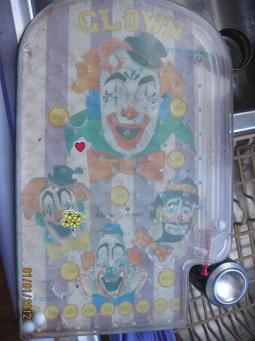 Vintage Clown pin ball hand-held game.