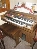 Two key-board organ with stool.