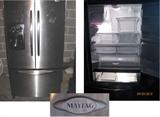 Maytag side-by-side fridge in great condition.  Water dispenser needs cleaning.
