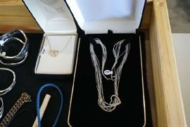 Sterling necklace 10KT gold & diamond horseshoe necklace on left