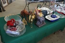 Solid brass horse, duck, elephant, what appears to be leather wrapped camel, rooster, duck soup tureen.
