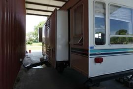 Small window broken on the back left.