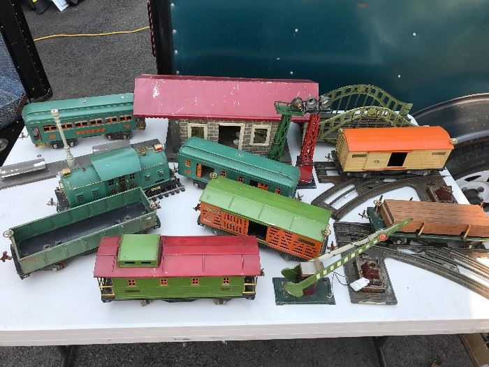 Pre WWII Lionel train engine, caboose, passenger, cars, bridge, track, house and misc. pieces