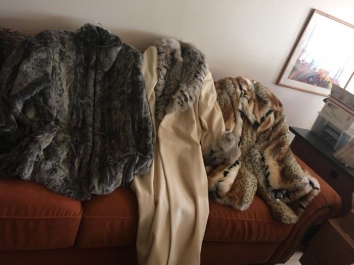 Faux furs and (middle) real fur trimmed coats. Most with tags, never worn.  More than 30 to choose from!  Plus sizes.