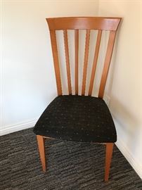 total of three of these chairs, two have arms.