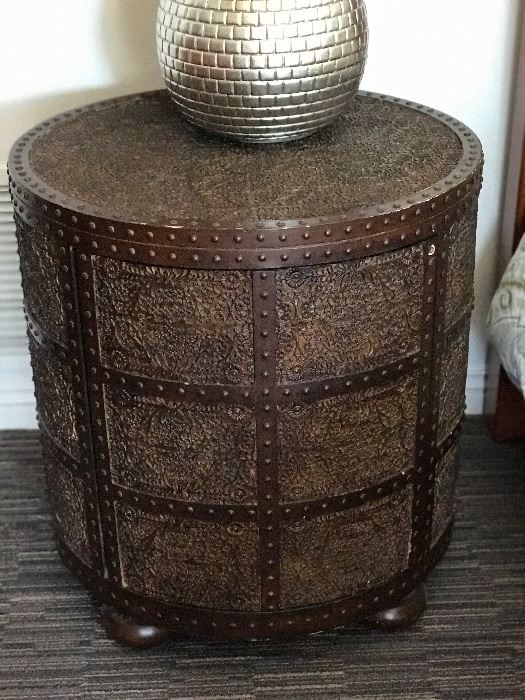 Unique nailhead table with storage.