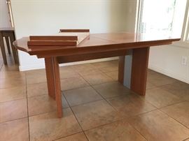 Copenhagen dining table with a leaf to expand table.