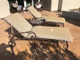 2 Iron chaise lounges. Frames and wheels in great shape, just need some new cushions.