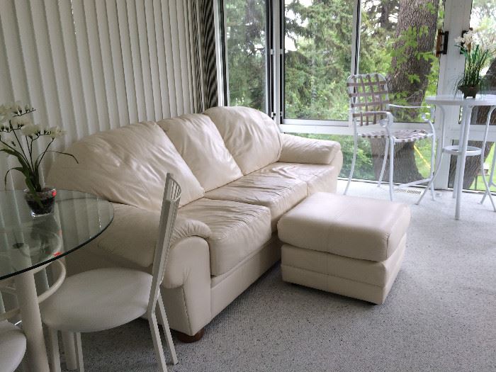 White leather sofa and ottoman