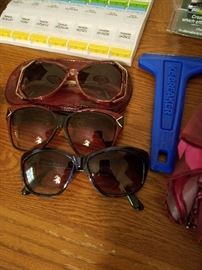 Sunglasses, pillbox, ice scraper