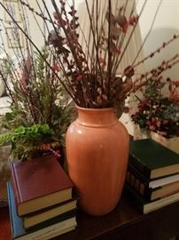 dried floral arrangements and books