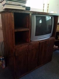Hand crafted wood entertainment center, television