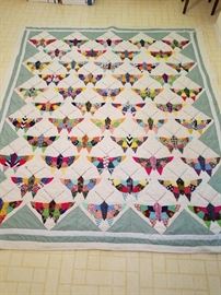 Butterfly patterned quilt. handstitched