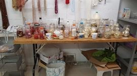 MANY LONG HEAVY WOOD WORK TABLES WITH METAL LEGS.