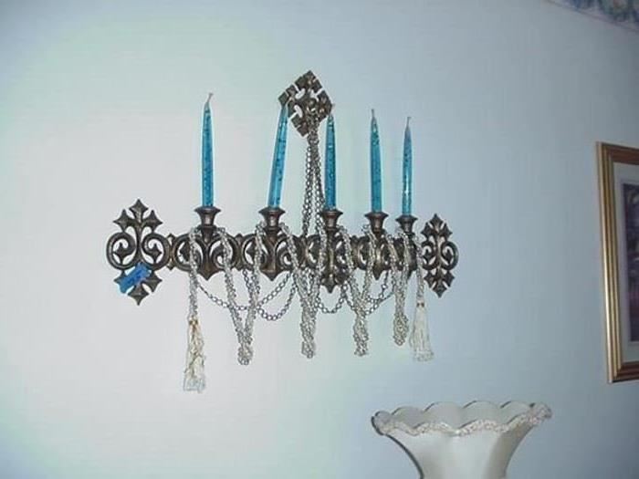 Elaborate carved wall sconce