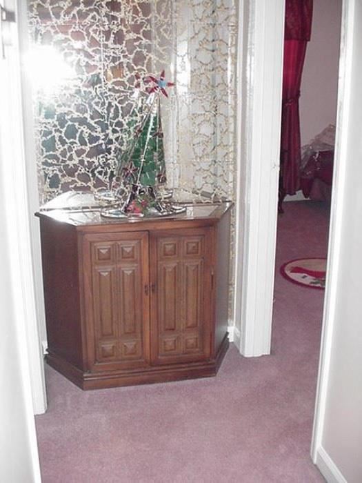 Double door console cabinet; leaning Christmas tree