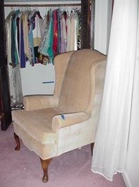 Upholstered wing chair and clothing