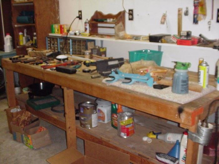 Work bench with hand tools and cleaning products